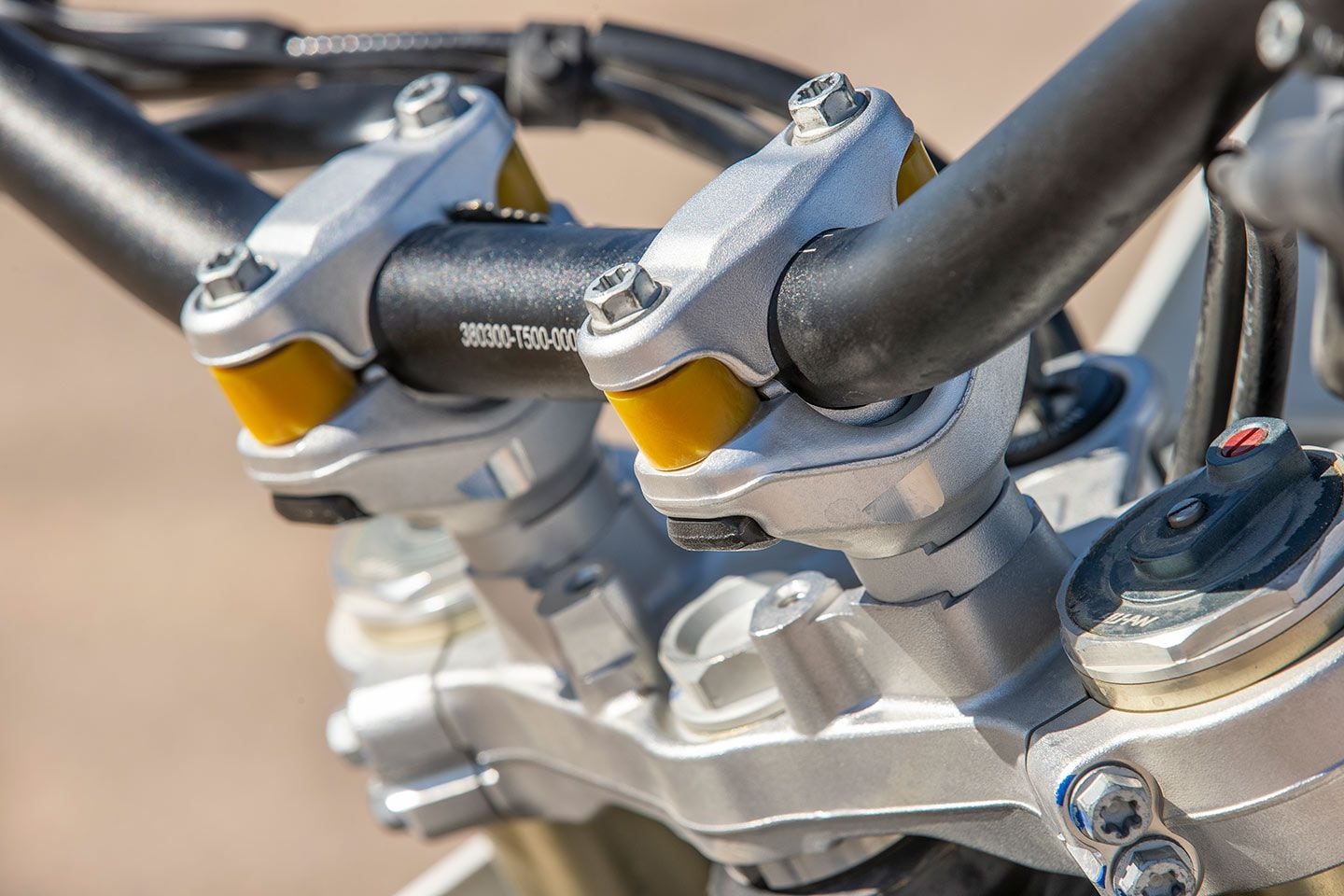 Mounting points for a steering stabilizer are included on the top triple clamp and frame.