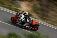 2024 Yamaha XSR900 GP accelerating on country highway