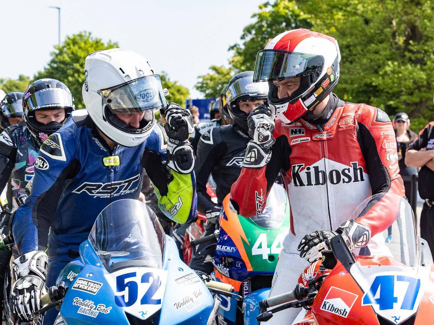 When you are lined up shoulder to shoulder, but the starter sends you off one at a time for practice, who goes first? Gary Vines (52) on his Honda CBR600RR and Richard Wilson (47) also on a Honda 600, rely on the universal decision-making process of Rock, Paper, Scissors. Of course, two out of three takes the lead position.