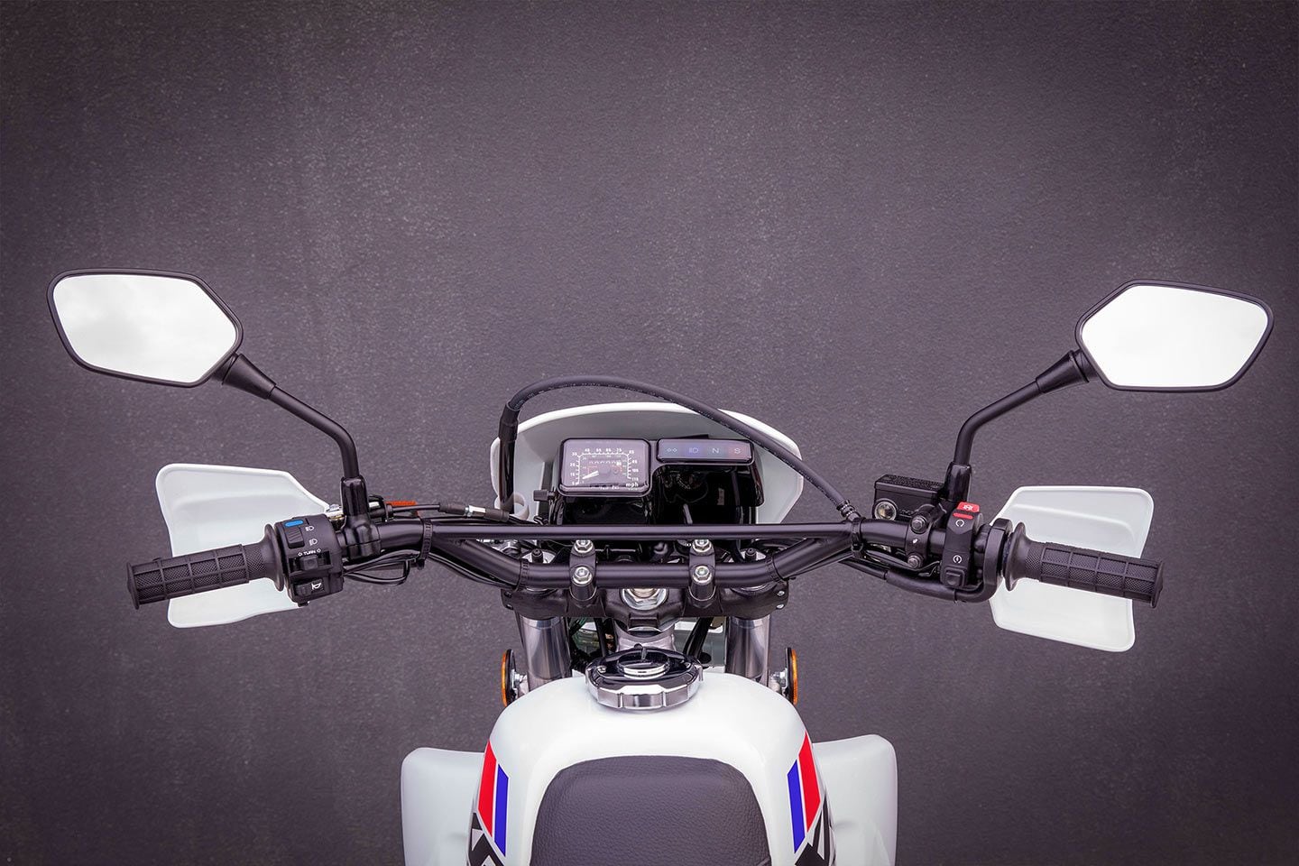 The bare-bones cockpit has nothing superfluous. The speedometer goes to 115 mph. The motorcycle’s top speed is pretty close to that as well.
