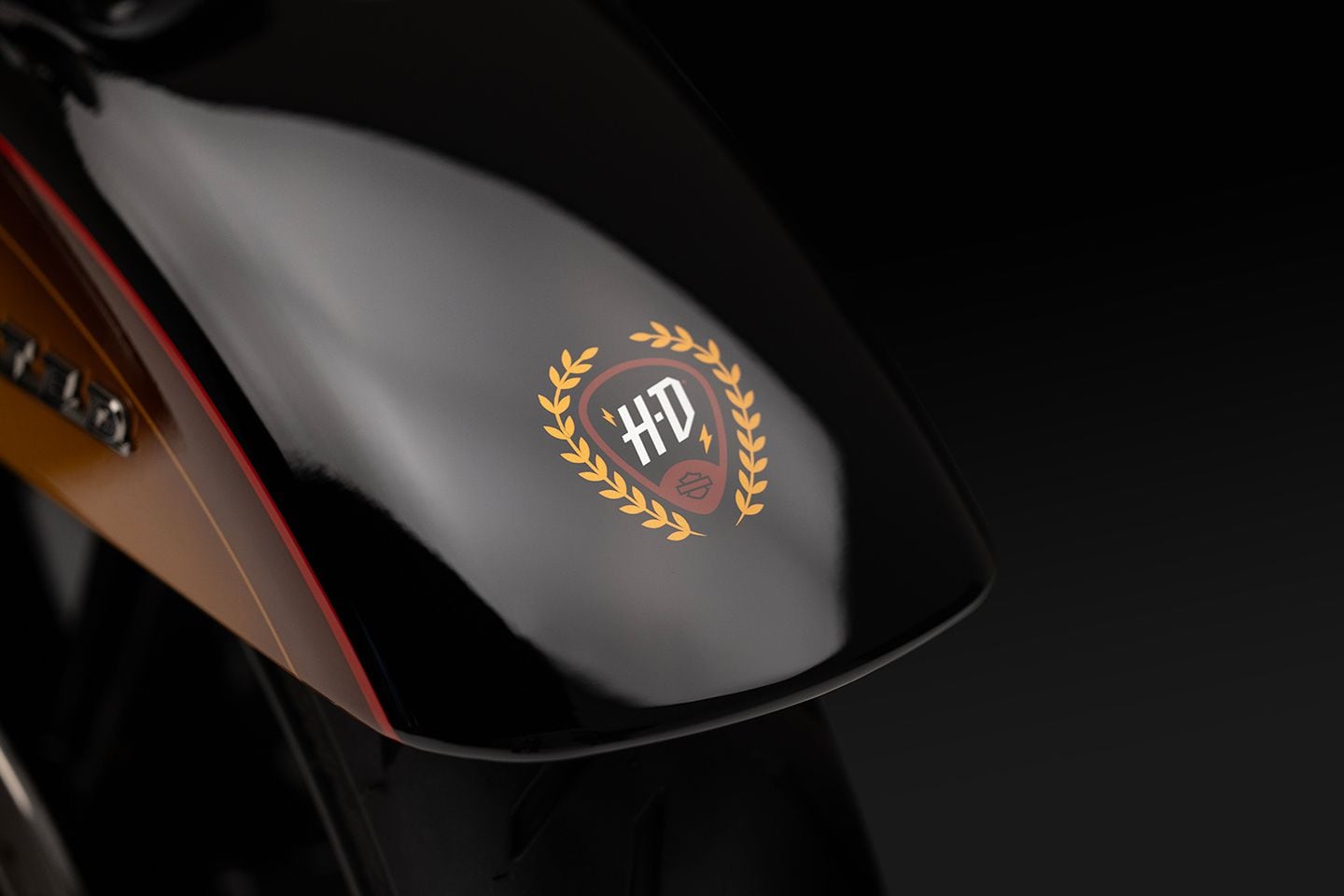The logo on the front fenders resembles a guitar pick.