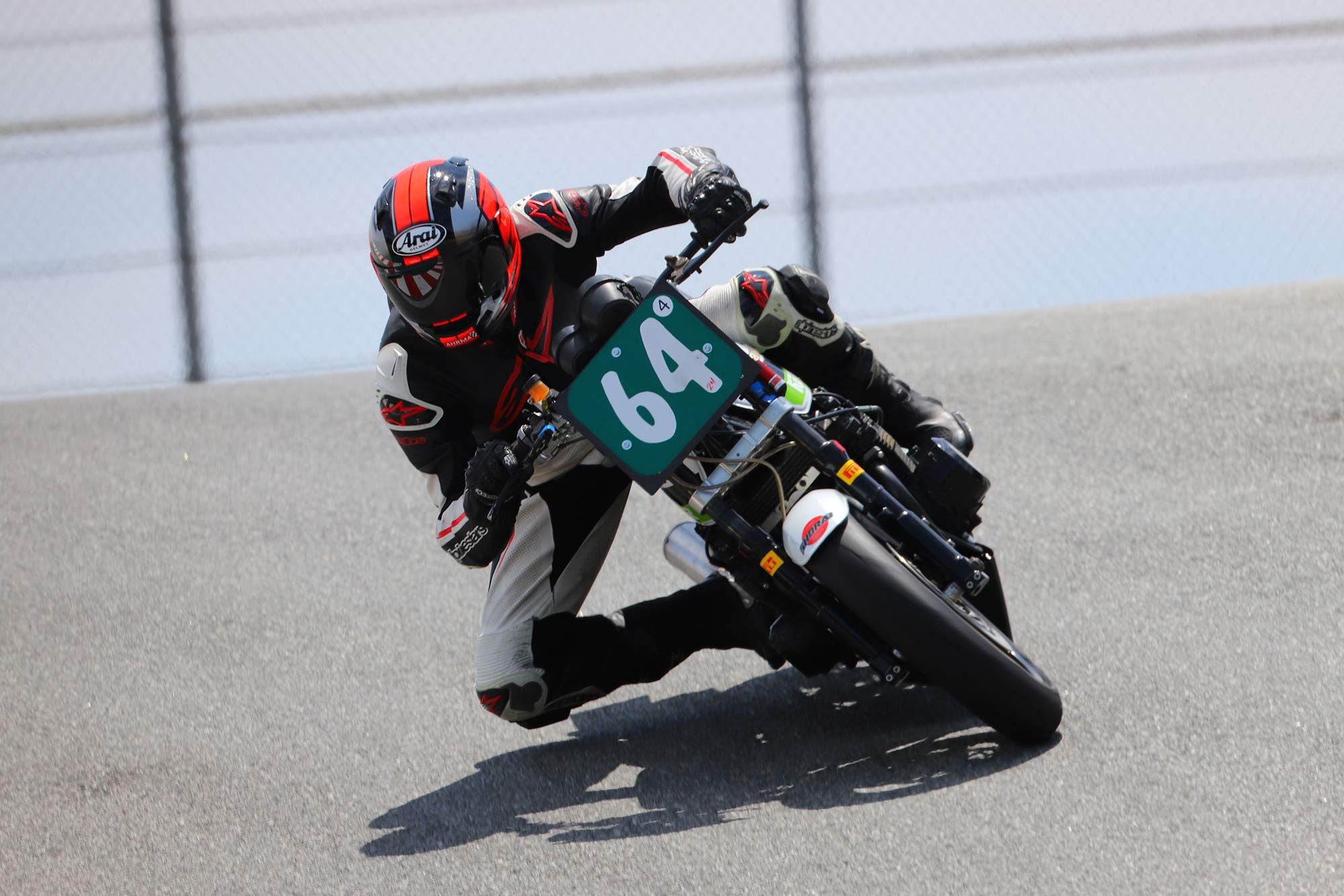 Laguna’s epic Corkscrew aboard Chris Carr’s 1981 Kawasaki GPz550 built by HyperCycle. Could there be a better birthday party?
