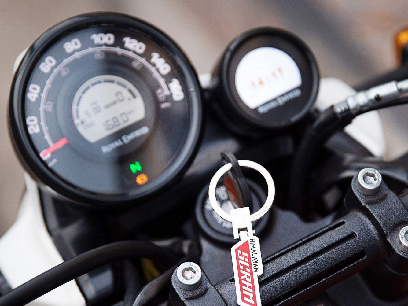 Just a simple analog speedo and small digital display join the Tripper nav system in the cockpit.