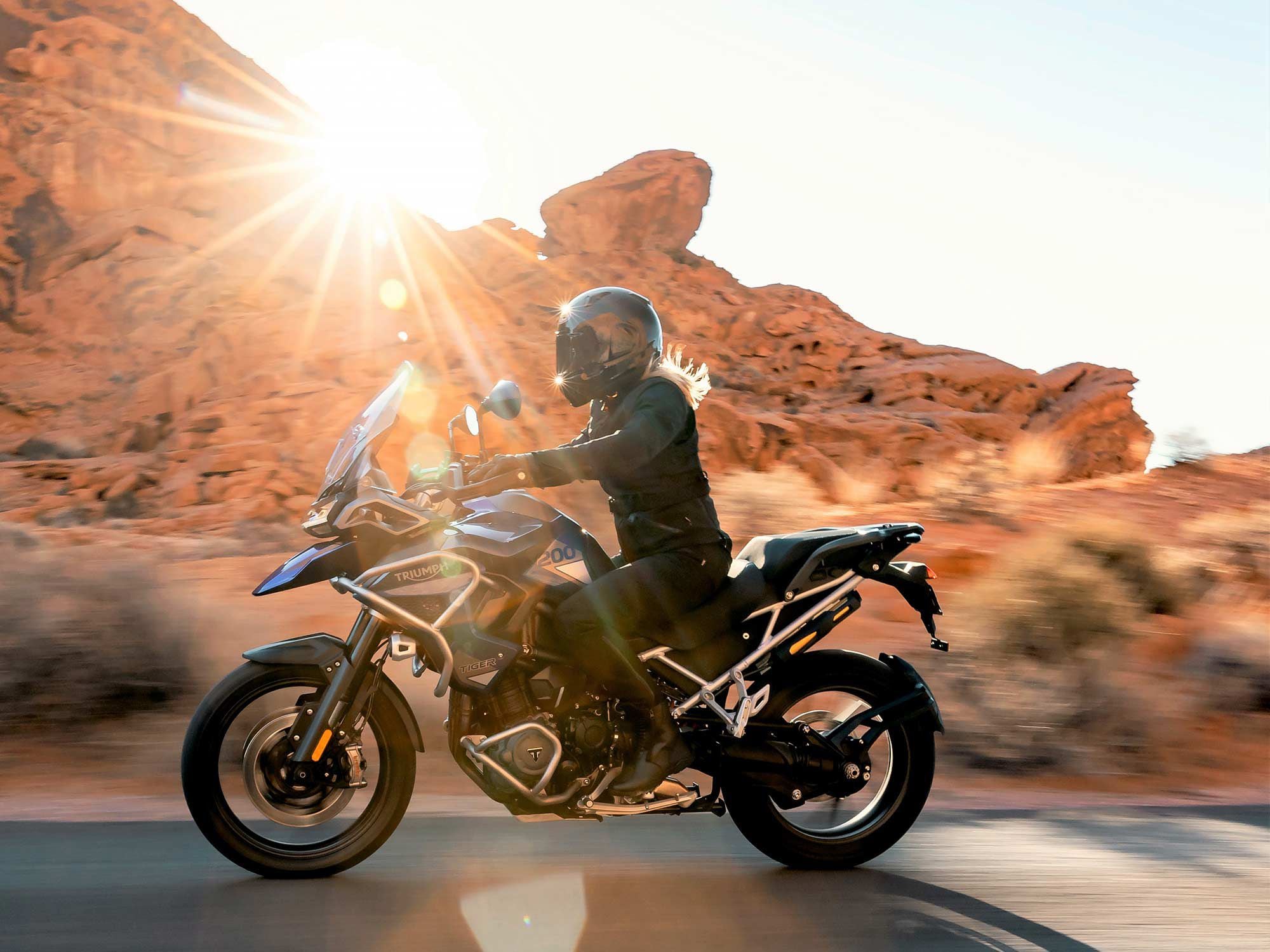 New shaft drive system utilizes a dual side swingarm that’s lighter than previous version; IMU-enabled cornering traction control and ABS are standard.