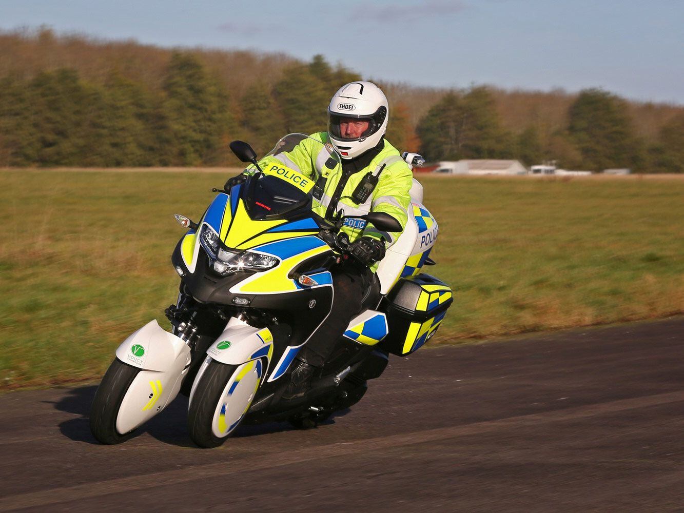 The leaning trike utilizes a central duct to reduce drag while also offering engine cooling benefits.