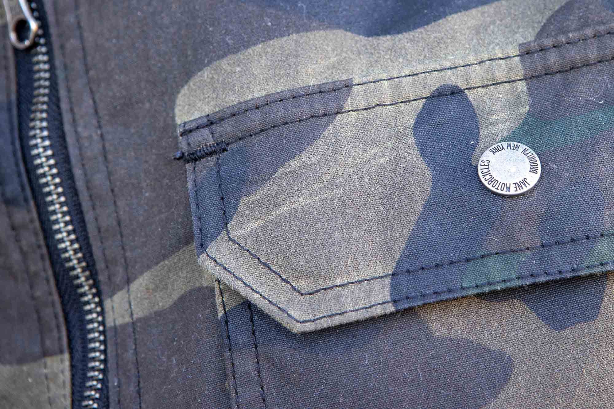 Stress points, like the corner of the breast pocket seen here, are reinforced with added stitching for strength and reliability.