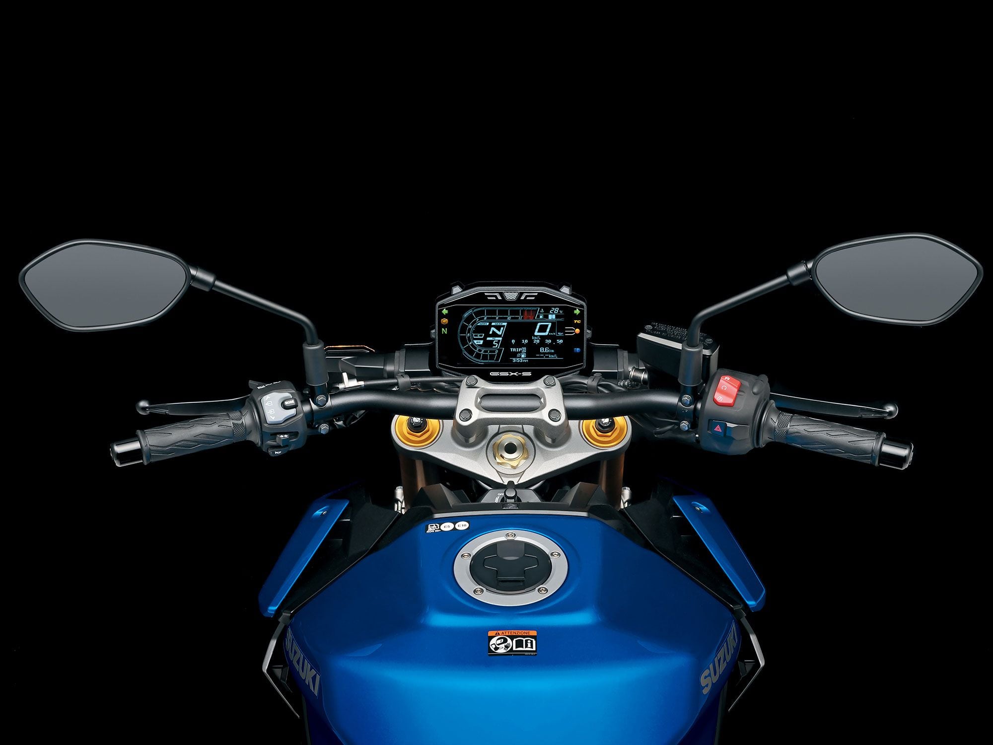 LCD instrument includes dual tripmeters, gear position, engine temperature, range to empty, lap timer, fuel consumption data, traction control and ride mode, fuel gauge, clock, and quickshifter indicator.