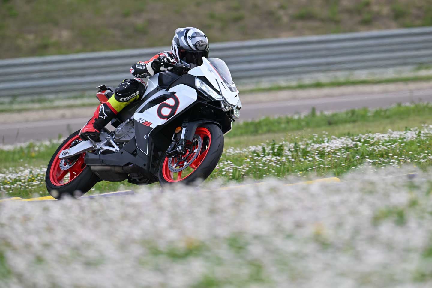 Riding the 2024 Aprilia RS 457 around the Italian racetrack Autodromo di Modena.