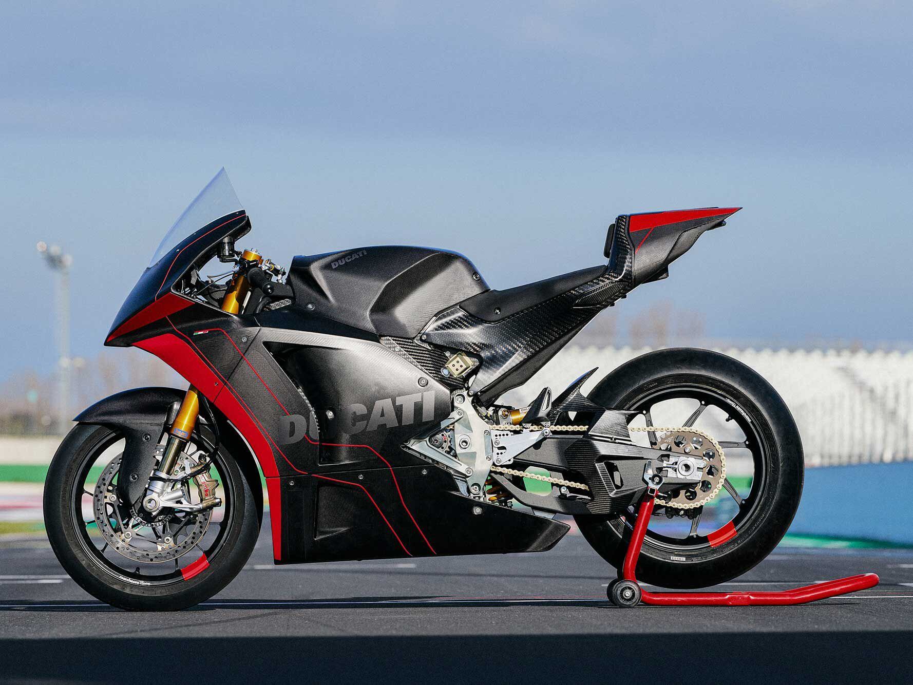 Carbon fiber dominates the V21L design, with a monocoque-style chassis likely housing the batteries. The motor will be liquid-cooled.
