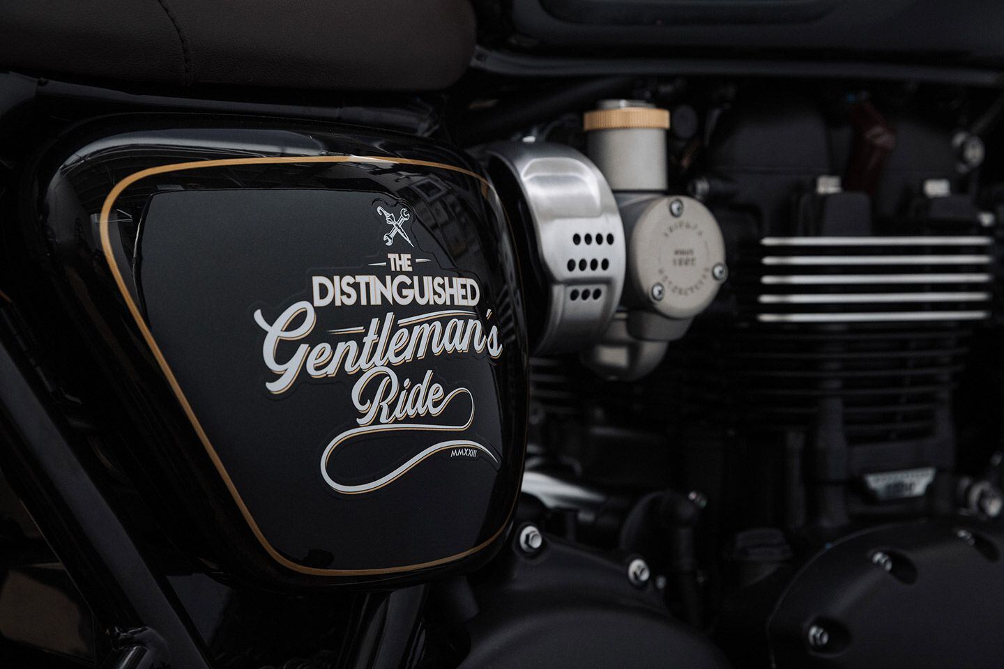 The side panels feature a more prominent DGR logo treatment framed by pinstripes. The umbrella and wrench will likely get more than a few questions from bystanders.