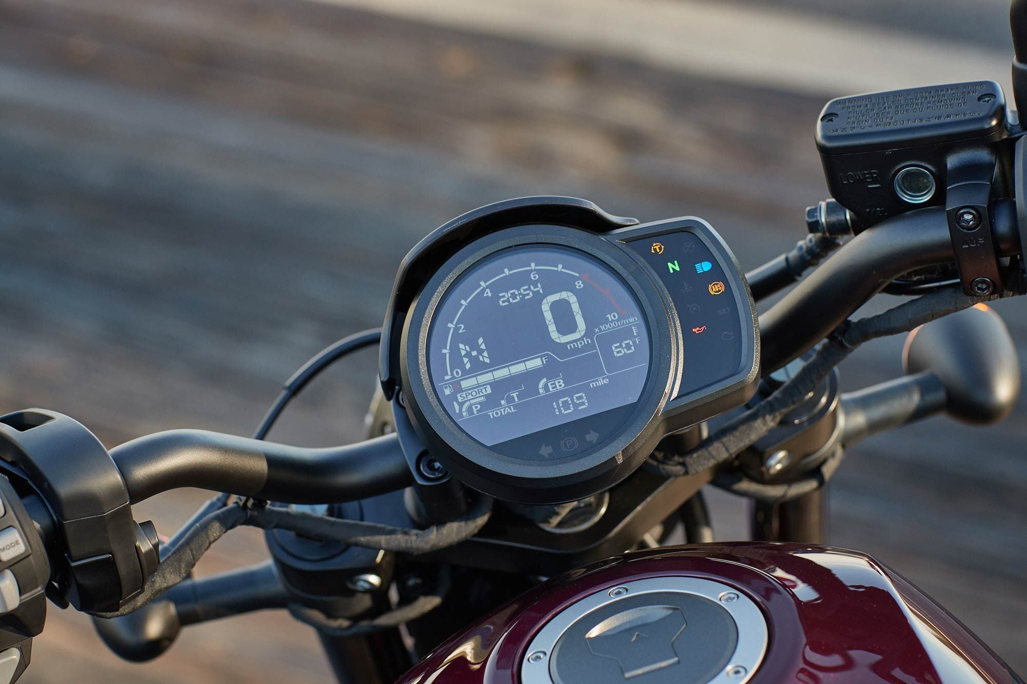 A central LCD instrument cluster serves as the information hub for the Honda Rebel 1100.