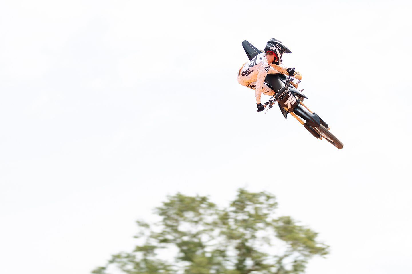 Evan Ferry, son of legend Tim Ferry, whips the Triumph 250cc MXer.