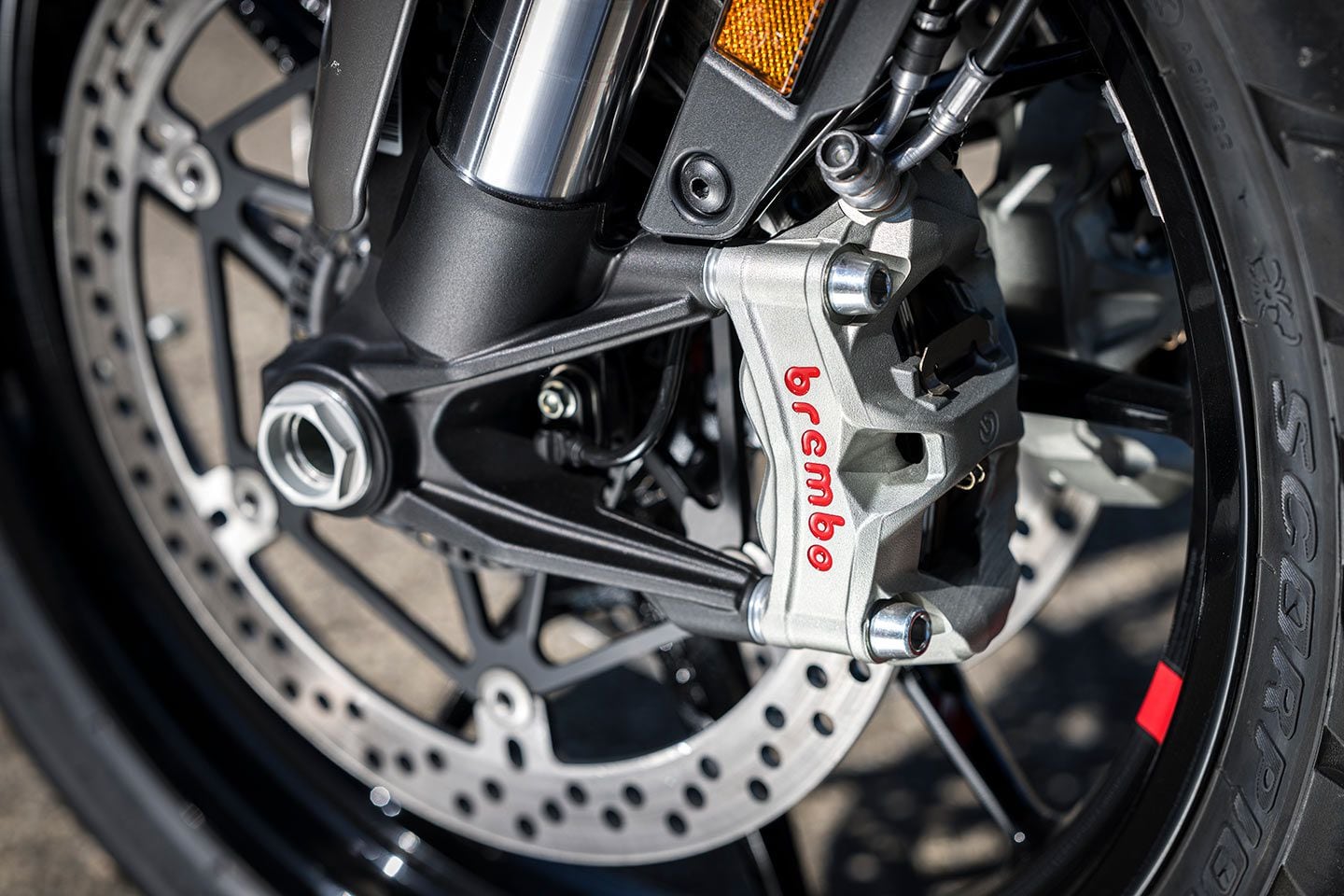 Brembo Stylema front calipers matched to 330mm discs offer sportbike-like braking performance.