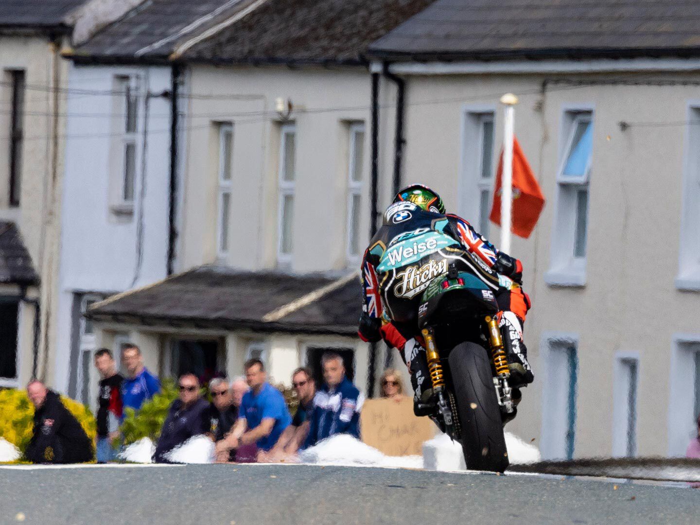 Leaving Ballaugh Bridge, we see what racers saw of Hickman and his Paton 650 while on the course and on his way to winning his third TT of 2022. He was the only rider to exceed a 120 mph average race speed in Bennetts Supertwin.