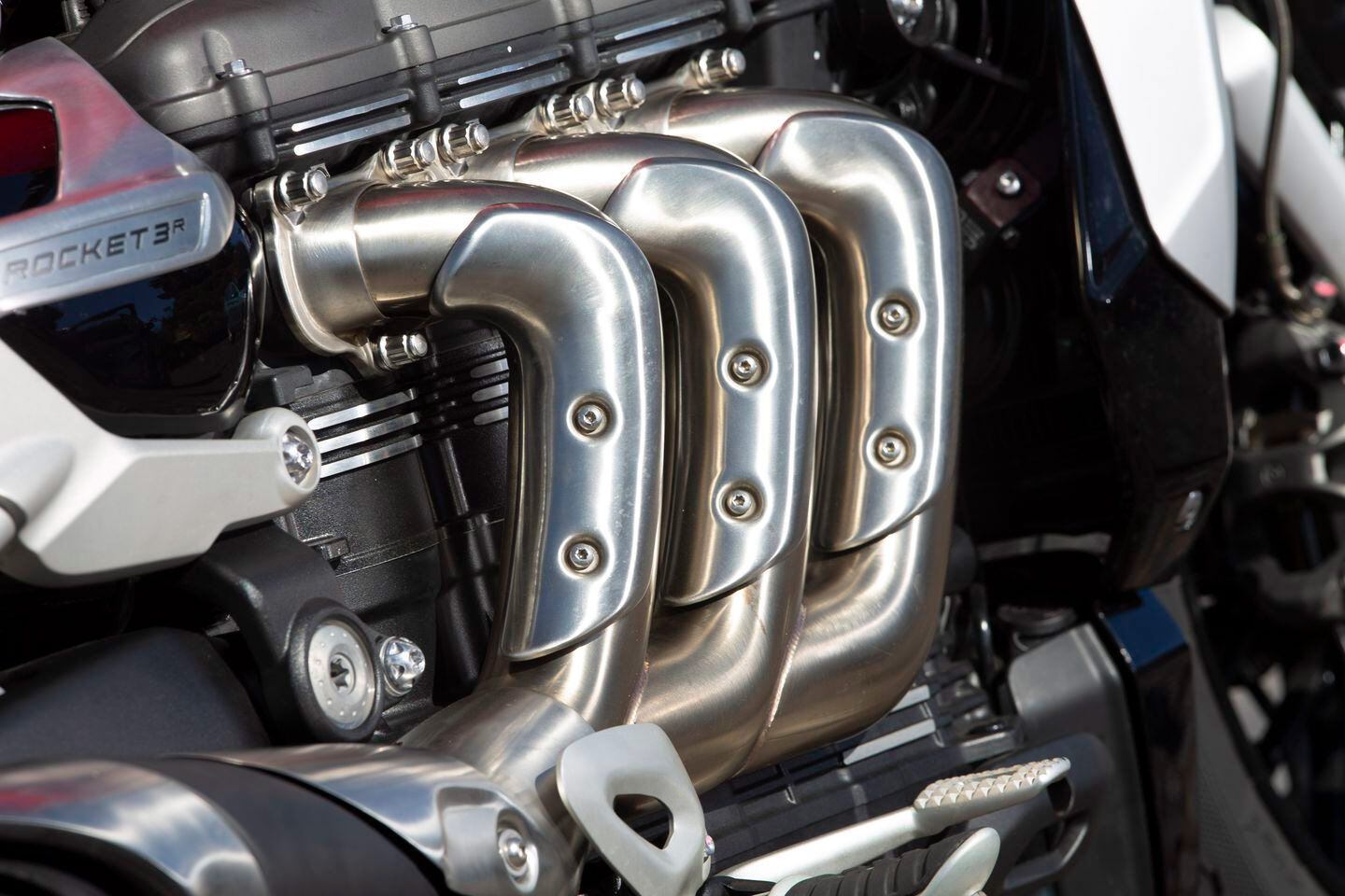 A stripped-down roadster appearance showcases the centerpiece of the Rocket 3: the engine.