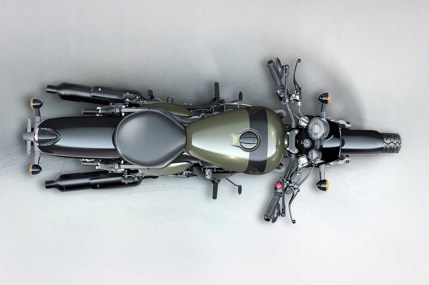 A better view of the Shotgun’s solo-seat configuration, wider bars, mid-mount controls, and differently shaped fuel tank.