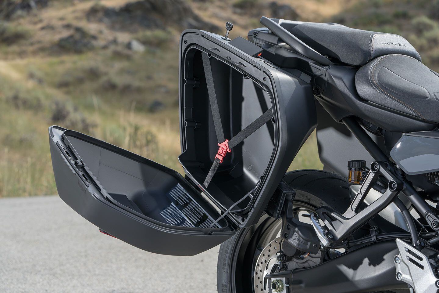 The 30-liter-capacity side cases have rubber dampers to keep bag contents from getting scrambled.
