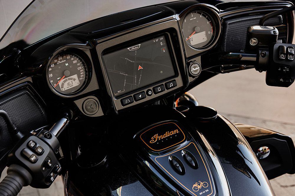 Cockpit view of the 7-inch display with  Indian’s Ride Command System. Exclusive to this Elite is a gloss black dash and individually numbered console with the silhouette of a 1904 Indian Camelback—the first Indian to feature Indian Red paint.