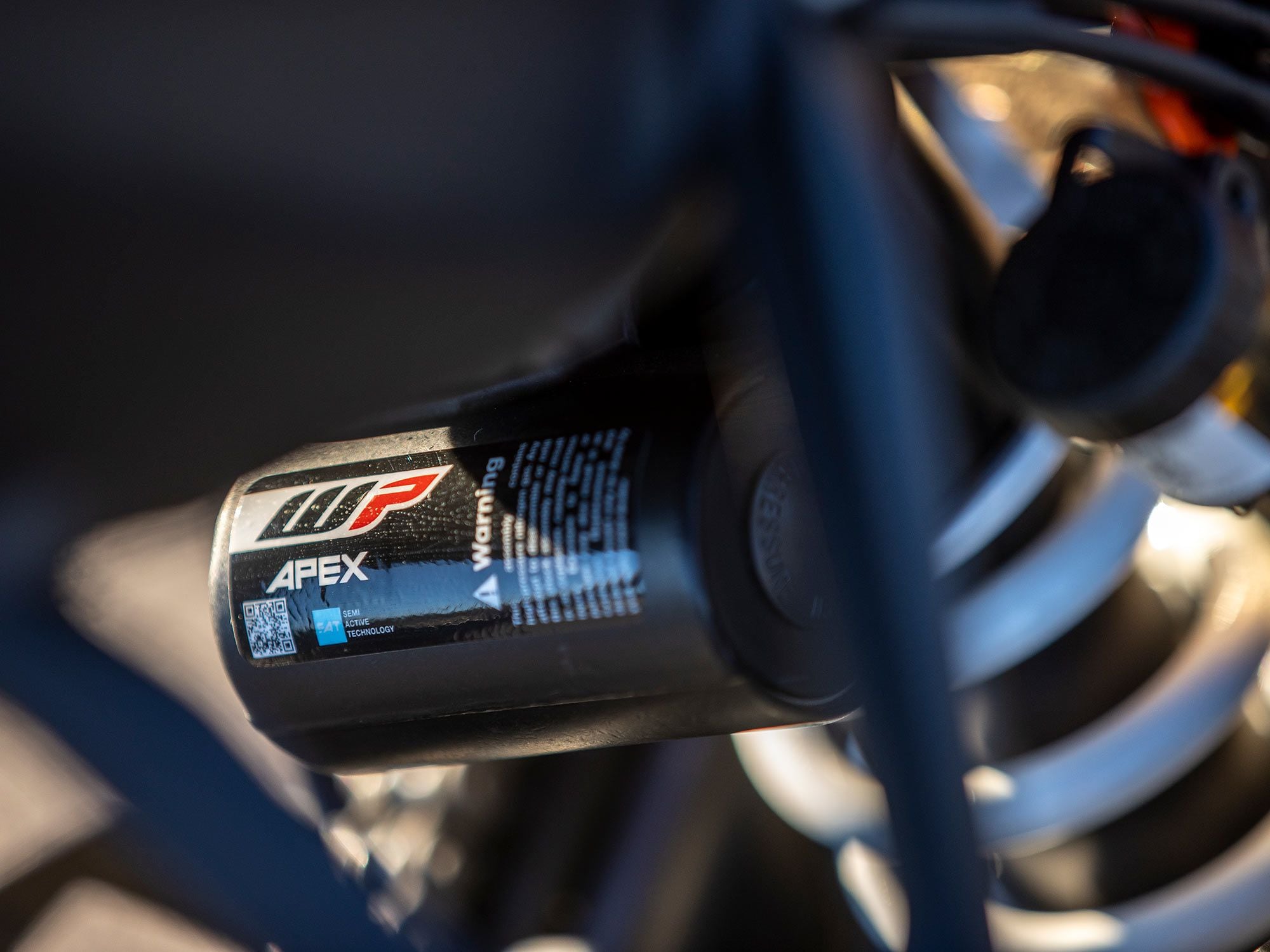 Spring preload on the WP Apex semi-active shock has multiple electronically adjustable options.