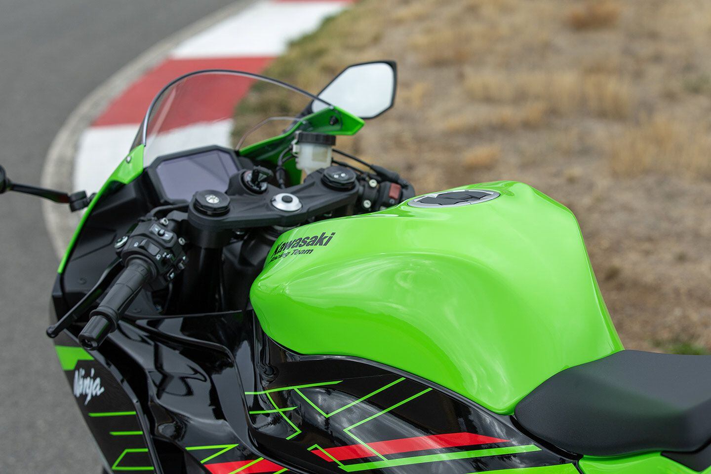 The riding position is typical for a sportbike. Tank, seat, and clip-on position are as they were before.