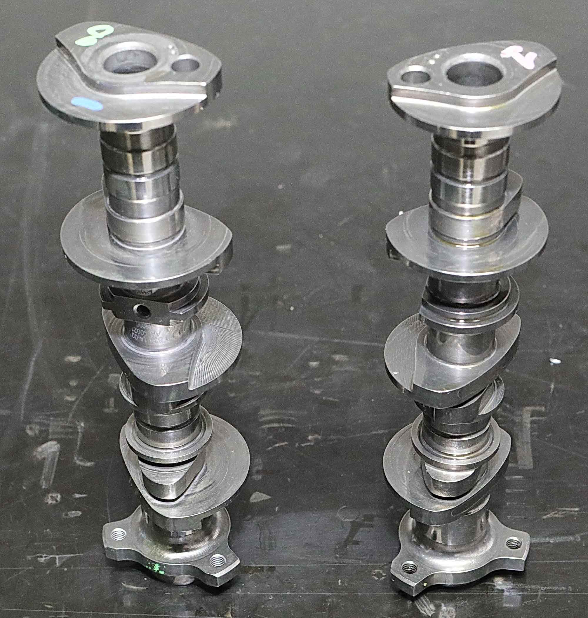 Desmo camshafts are unmistakable. Note that the large-diameter closing cam lobes feature a thinner section with reduced surface area: This is where they still bear against the follower, but do not operate the valve which is in its opening phase—a nice touch! Inlets open at 18 degrees BTDC and close 57.5 degrees ABDC; exhausts open at 60 degrees BBDC and close at  27 degrees ATDC, resulting in 45 degrees of overlap. Intake valve lift is 0.488 inch, exhaust valve lift is 0.425 inch.