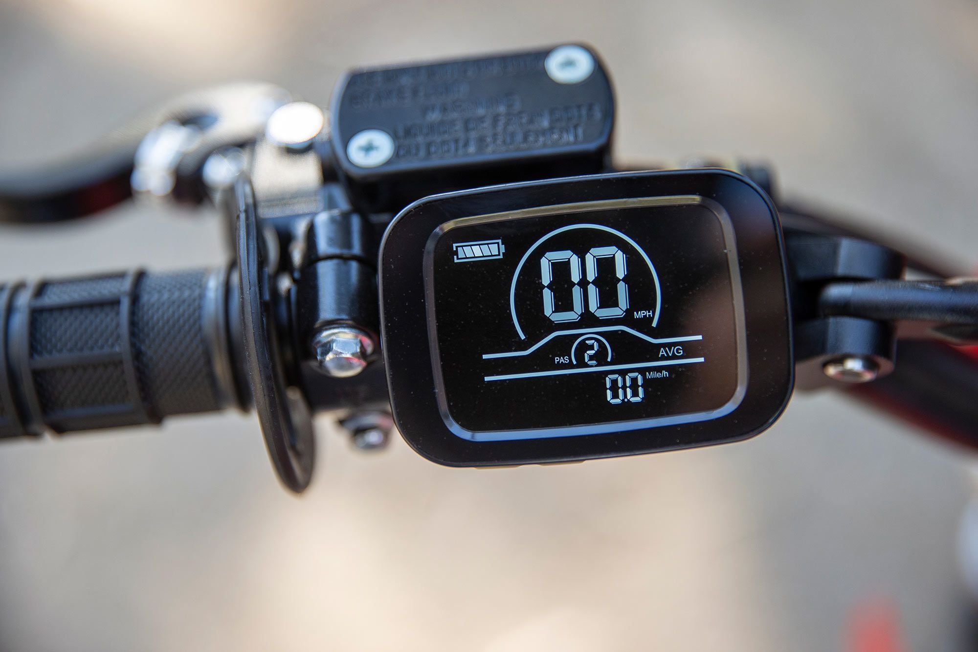 The Honda Greenger CRF-E2 display is clear and bright. Here the bike is shown ready to ride (00 mph displayed meaning throttle is active) and in Stage 2, the faster and more powerful of the two modes.
