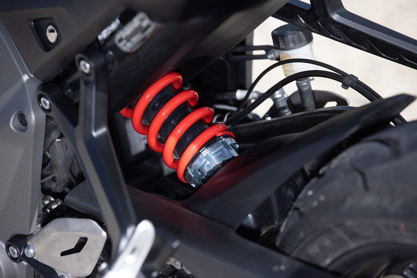 The Showa monoshock has preload adjustability.