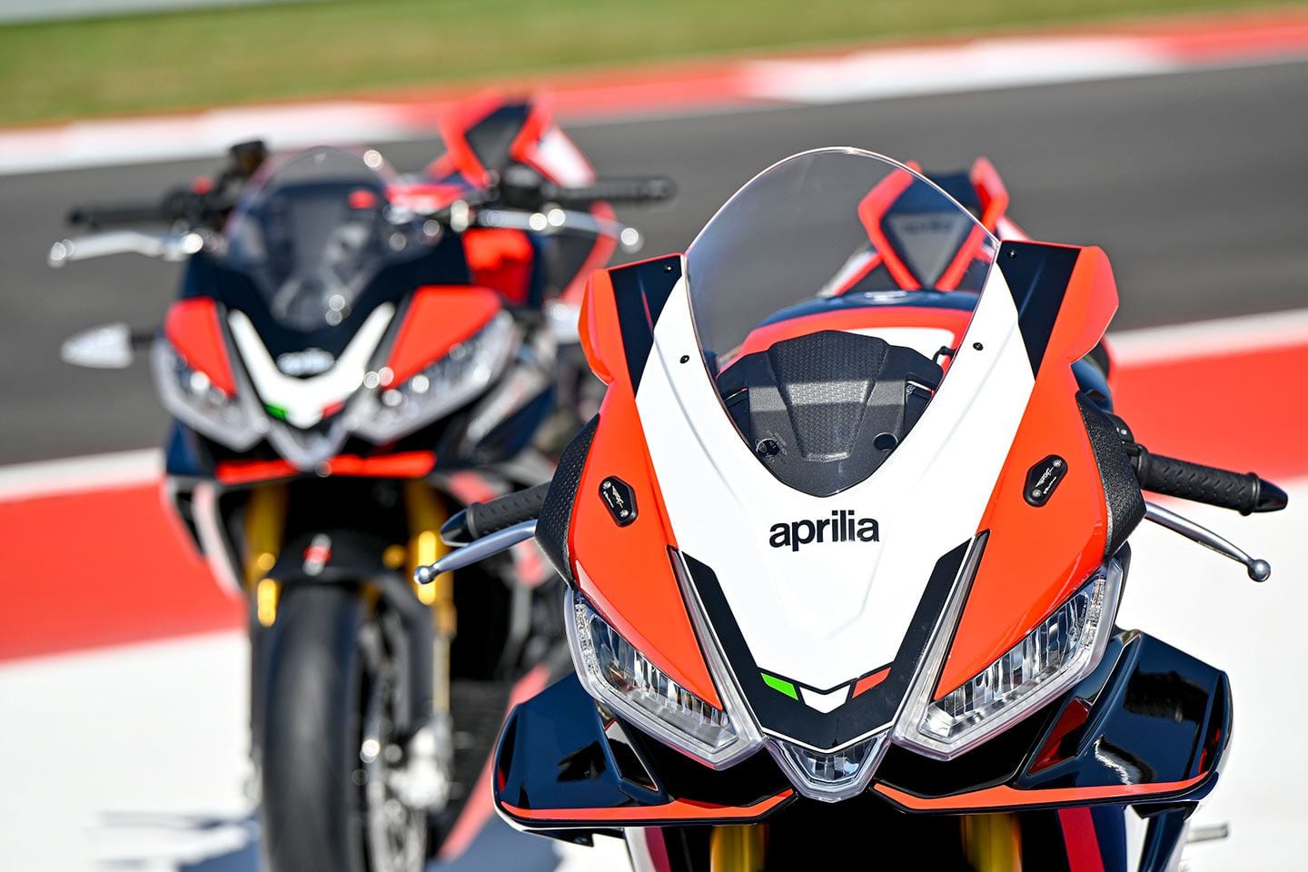 The RSV4 (foreground) and Tuono (back) at the track. | Photo: Piaggio Group