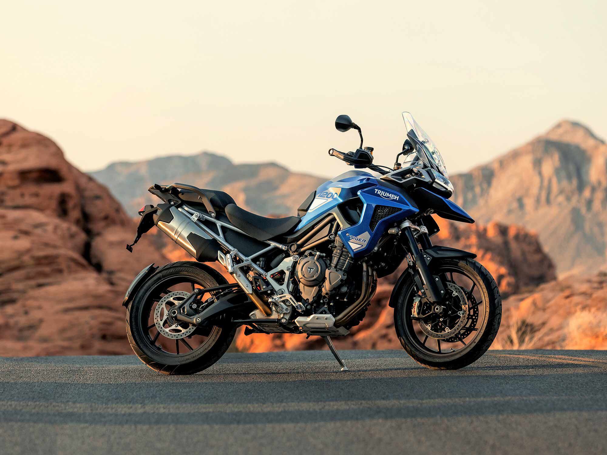 All the new Tigers are fitted with an 1,160cc triple engine mated to a T-Plane crankshaft layout and shaft final drive. Shown is the 1200 GT Pro, which wears road-biased tires on alloy wheels.