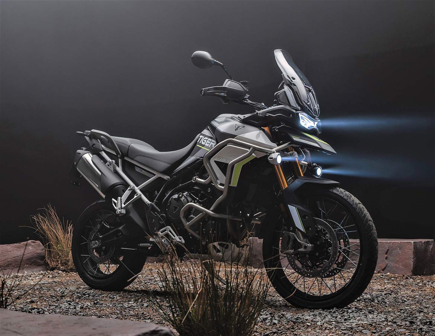 The 2024 Tiger 900 Rally Aragón Edition has a chunkier presence with added body protection and more subdued color scheme.