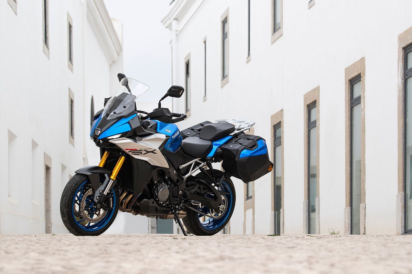 Angles? Yeah, the GX+ has those. Tucked behind the new fairings is one of the most recognized engines in modern motorcycling: the 999cc inline-four that powered the almighty K5 GSX-R1000. Retuned for its role in a variety of models, this has become an equally potent engine for street riding and touring.