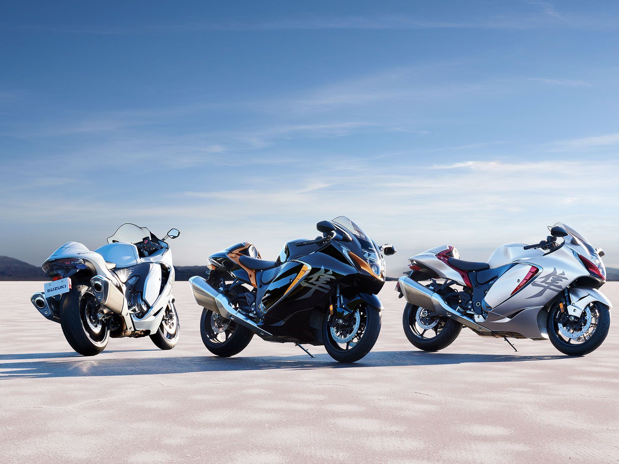 The 2022 Hayabusa will be available in three color schemes: Glass Sparkle Black and Candy Burnt Gold; Metallic Matte Sword Silver and Candy Daring Red; Pearl Brilliant White and Metallic Matte Stellar Blue.
