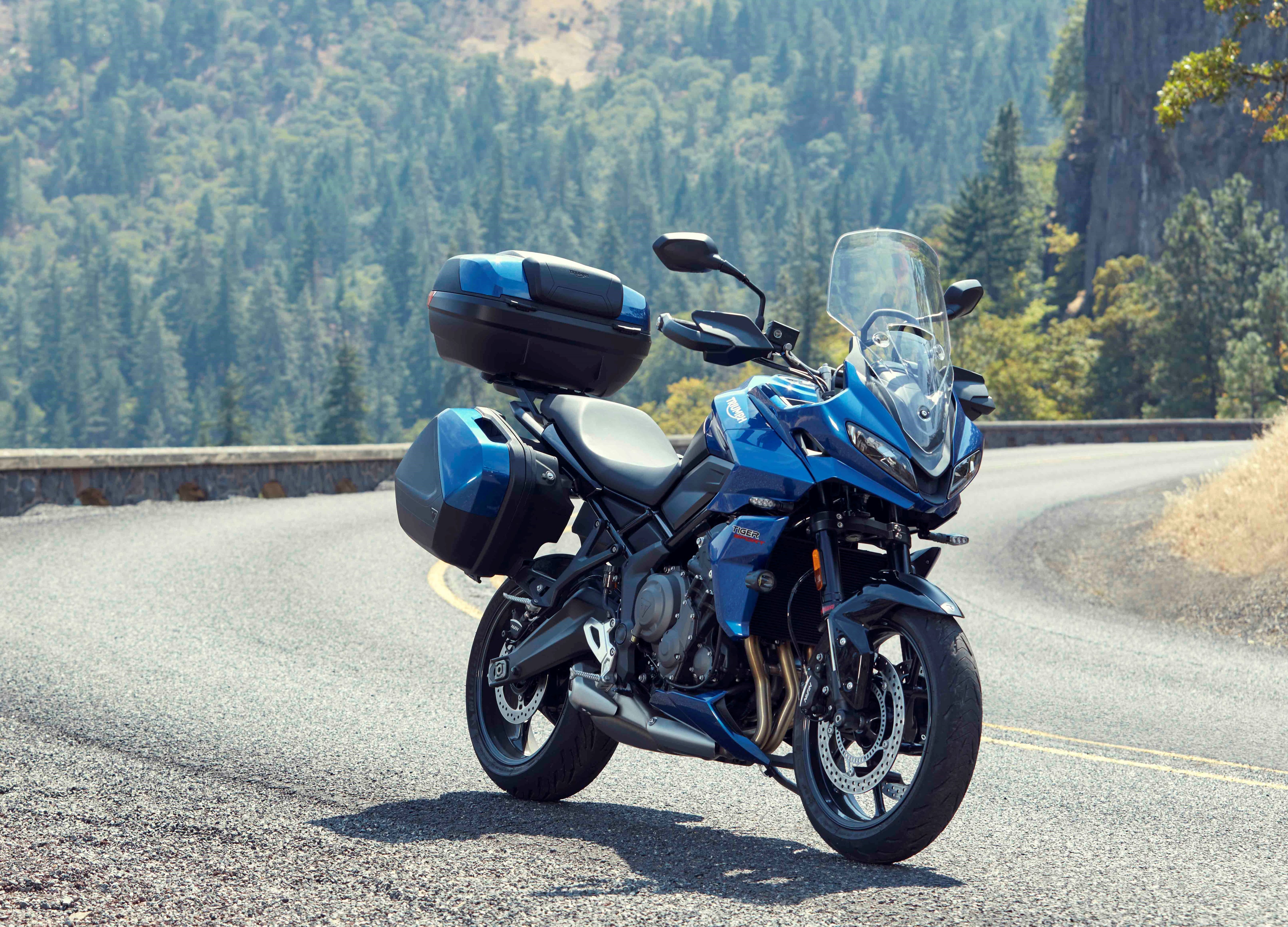 Triumph has developed a new luggage system to work with the integrated mounting points on the Tiger Sport 660. The side cases and 47-liter top box can be color-matched to the bike (Lucerne Blue shown here).