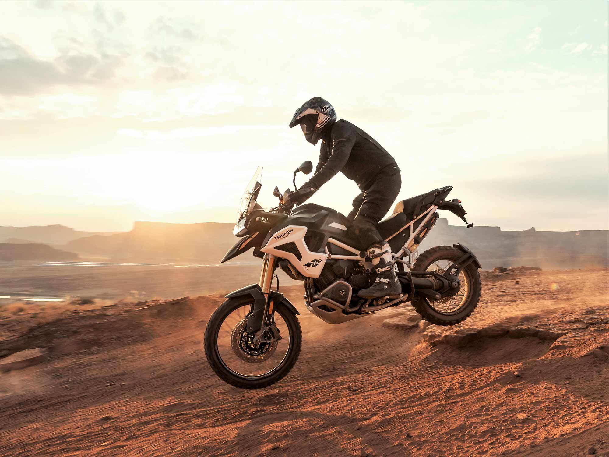 Electronically controlled Showa semi-active suspension appears on all models, though the Rally bikes (the Pro is shown) have longer travel, with 8.7 inches available at either end.
