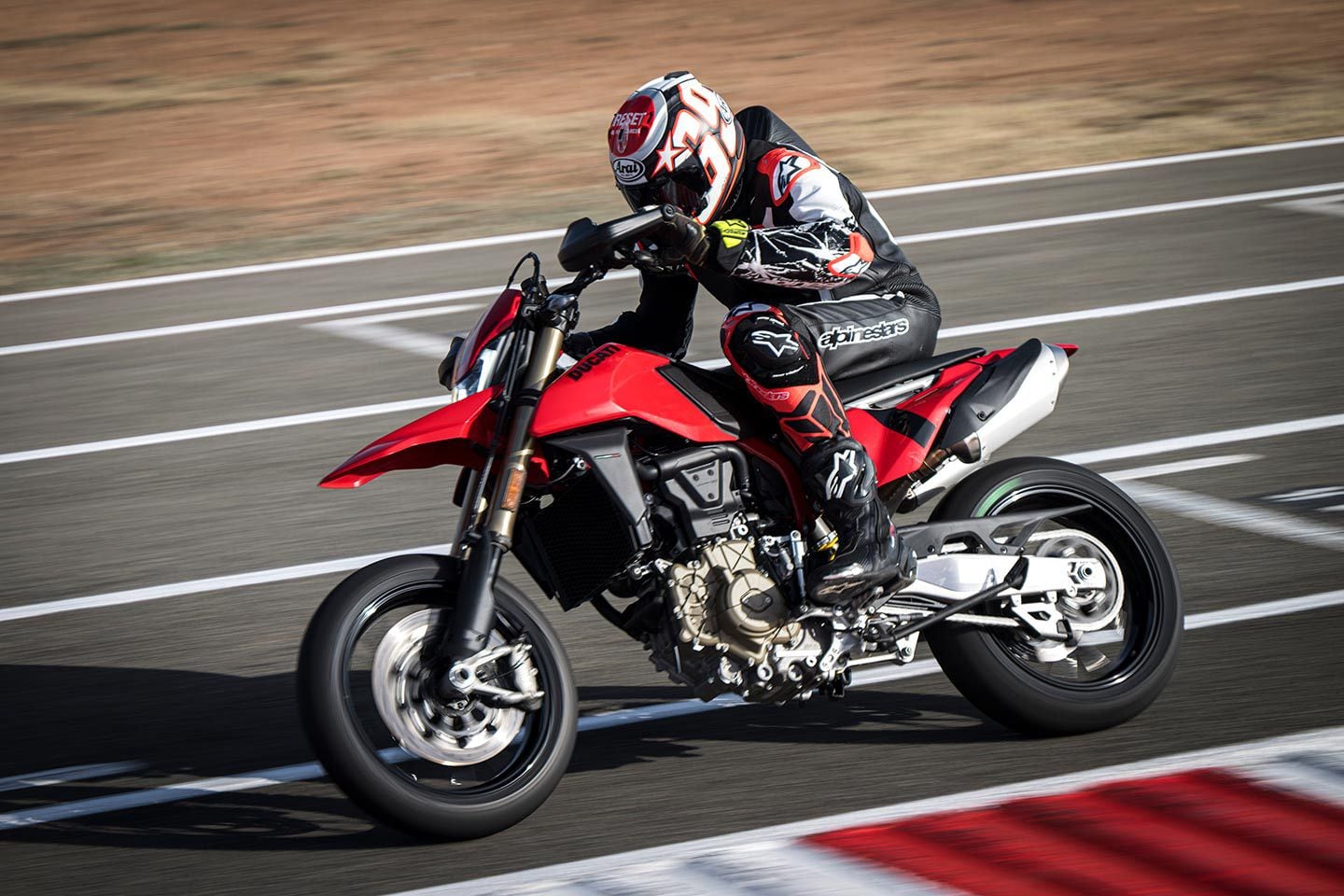 The single, 330mm front brake disc is 10mm bigger than the brake disc on KTM, GasGas, and Husqvarna models. That and an M4.32 caliper offer enough feel and power to drive the Hyper 698 deep into the corner. You won’t think of this as another “basic” single-disc setup.