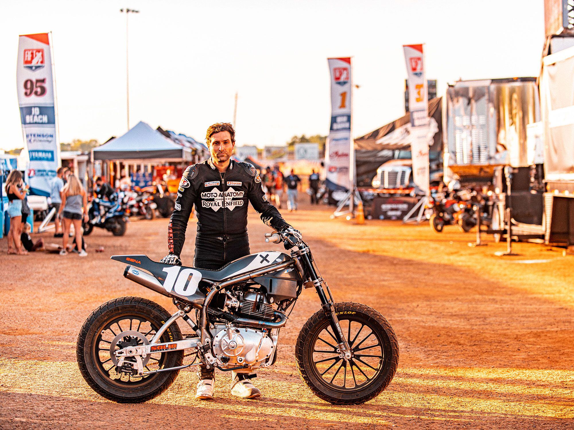 Rider Johnny Lewis with the very compact, mass-centralized RE. Note below his left hand one of two high-mounted oil coolers.