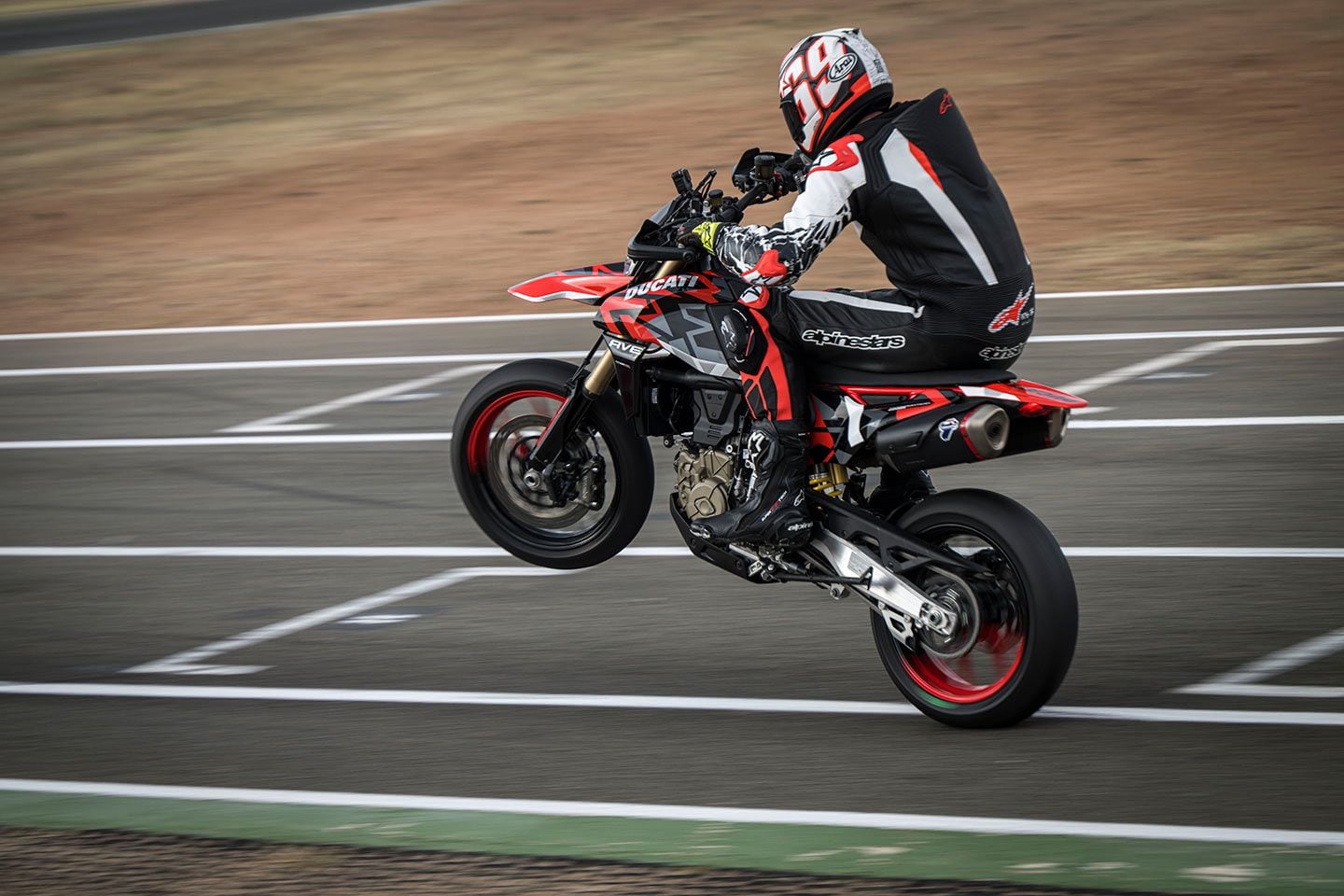 How does a claimed 77.5 hp and 333 pounds wet, no fuel look on a track? Like this—a lot! <i>CW</i> staffer Bradley Adams tests the production Hypermotard 698 Mono RVE at a kart track in Spain. Read his <a href="https://www.cycleworld.com/motorcycle-reviews/ducati-hypermotard-698-mono-first-ride-review/" target="_blank">full review here</a>.