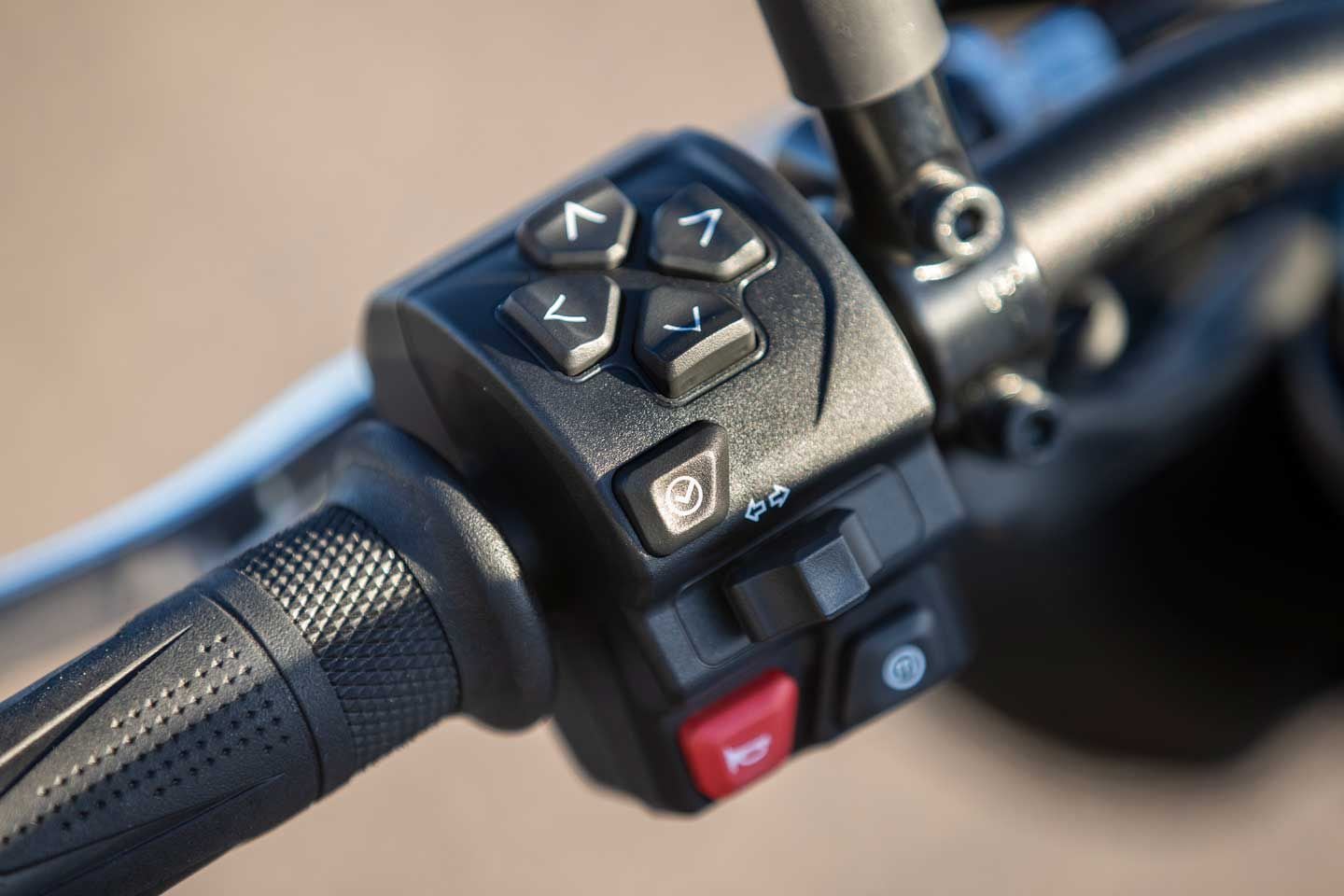 The left-bar-mounted control pod allows quick navigation of dash functions.