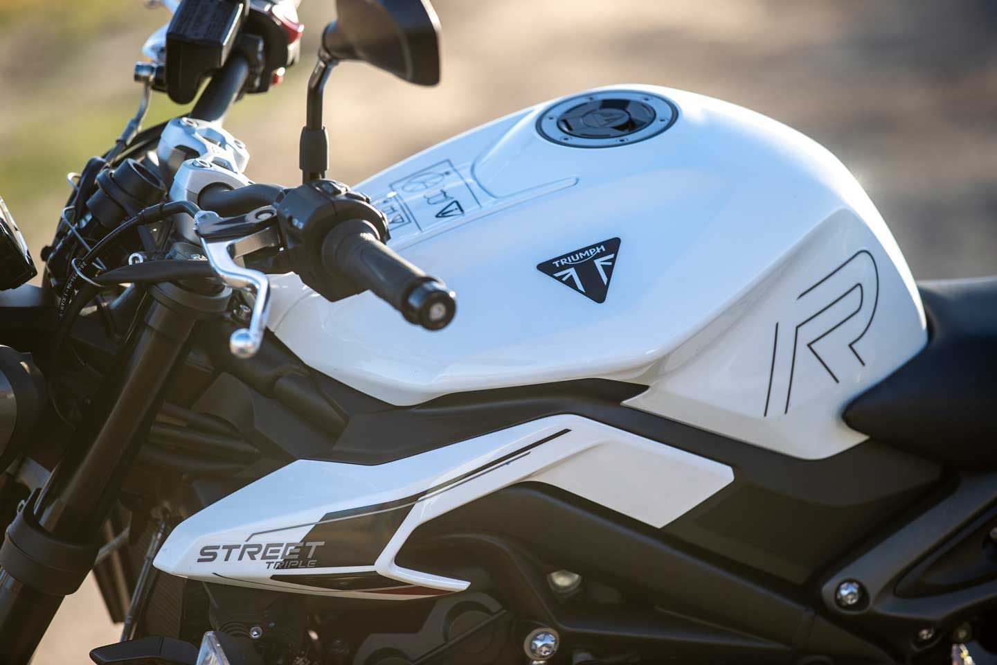 The 765 R is narrow between the knees, further adding to the range of riders who can comfortably get their feet down at stops.