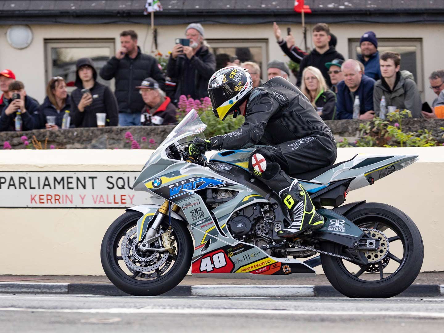 There are so many fabulous viewing spots at the TT that it’s hard to pick a favorite. In Parliament Square in Ramsey it’s possible to arrive early and get a spot in the garden of The Swan pub just a few feet from the action, which in this case is privateer Michael Russell on his BMW S 1000 RR.