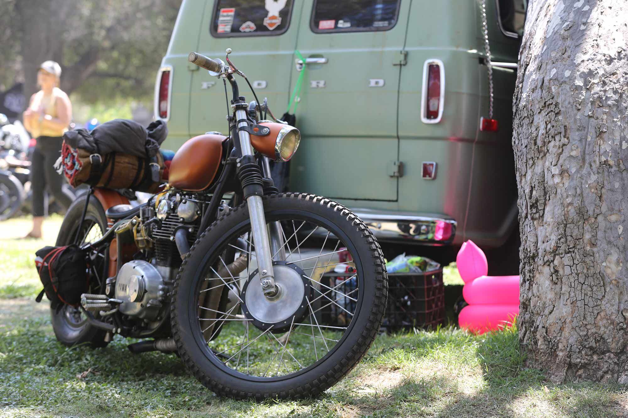 East meets west with this classy Yamaha XS650 and Ford van combination.