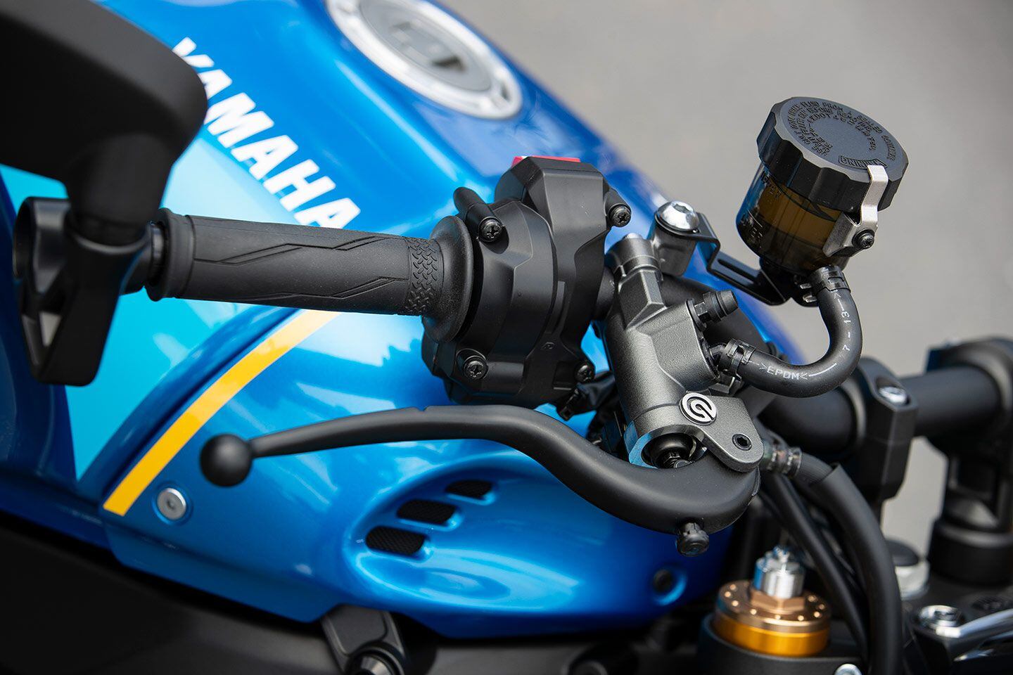 Radially mounted Brembo master cylinder improves braking performance.