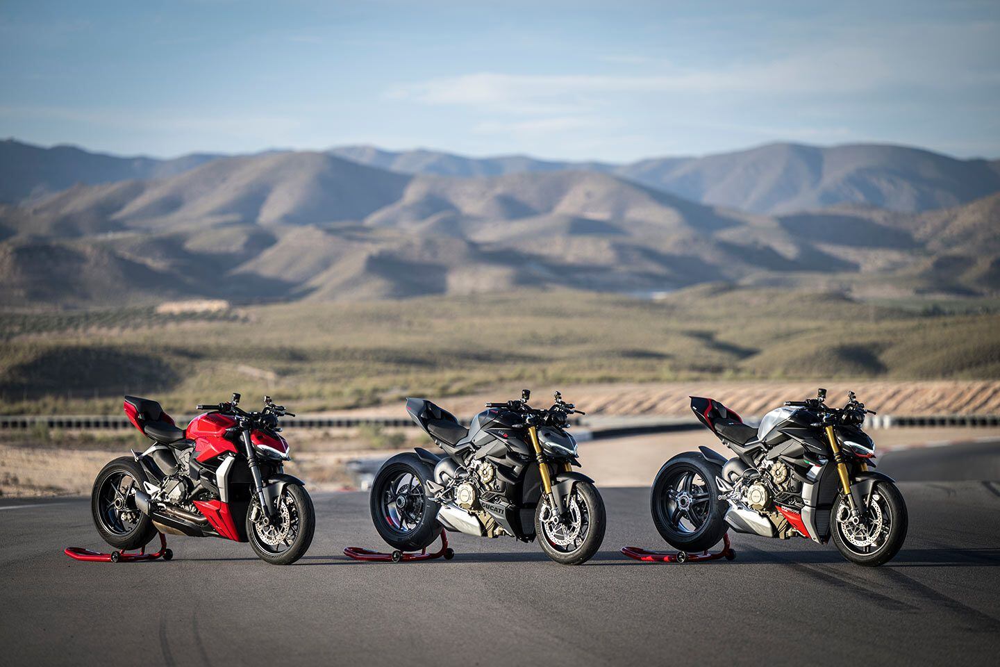 The Streetfighter V4 lineup includes the base model (left), V4 S (middle), and new V4 SP2 (right). Available only in the Winter Test livery shown here, the SP2 comes with carbon fiber wheels, Brembo Stylema R brake calipers, and a dry clutch. MSRP is $37,995.