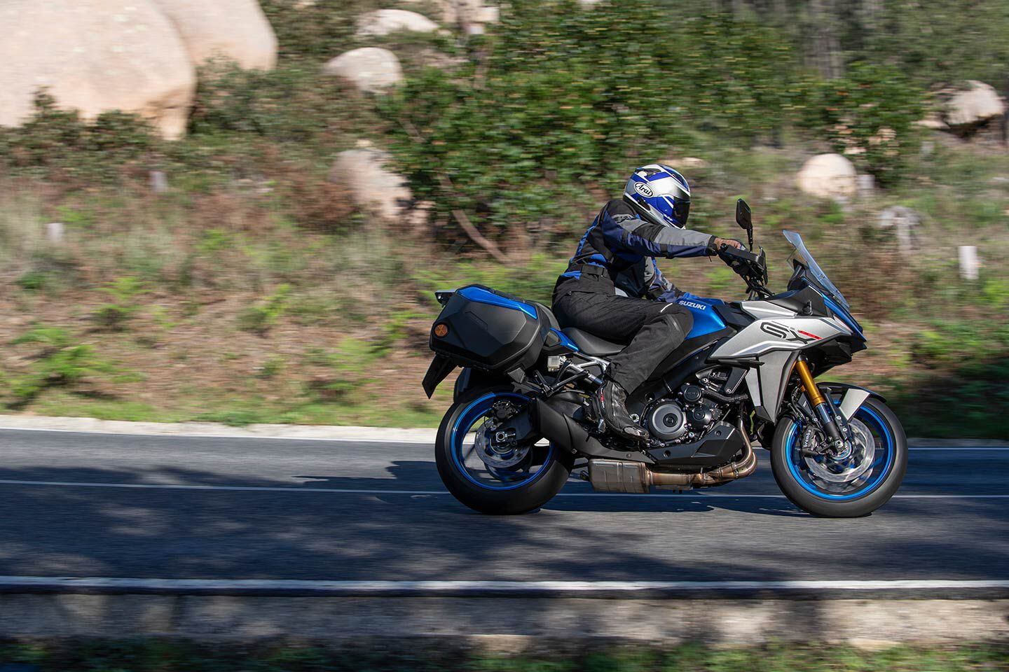 The GX+’s seat is 0.6 inch taller than the GT’s seat, for added legroom. The pegs remain in a relatively sporty position, but the riding position is more upright and relaxed than the GT’s. Credit a taller bar that also comes closer to the rider.