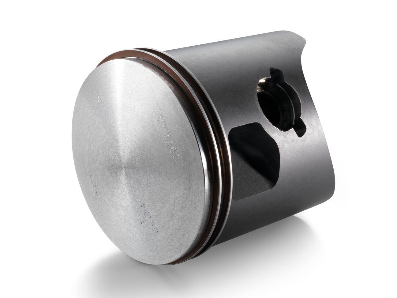 Pistons must be oval and tapered to have proper clearances when running.