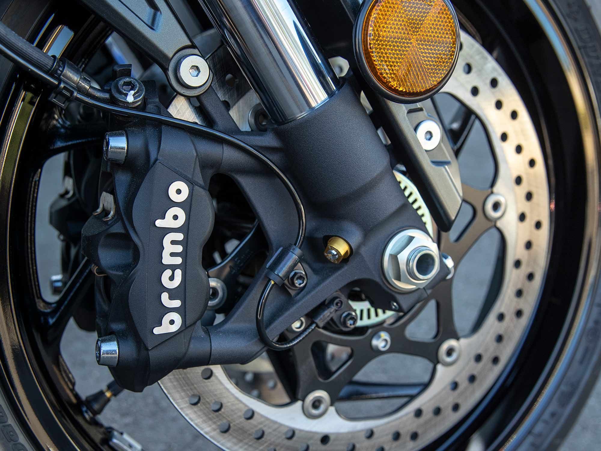 Brembo Monoblock four-piston calipers gnaw on a pair of 320mm discs.