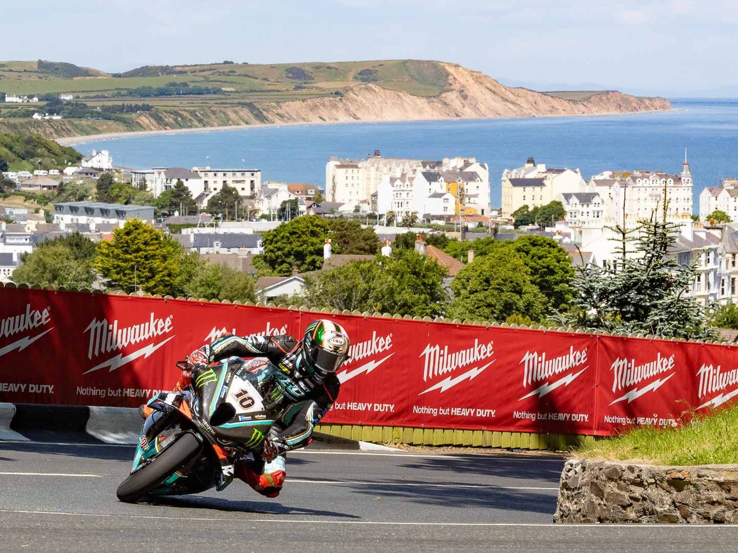 Leaving the village of Ramsey behind, Peter Hickman makes the hairpin and heads to his fourth TT win of 2023.