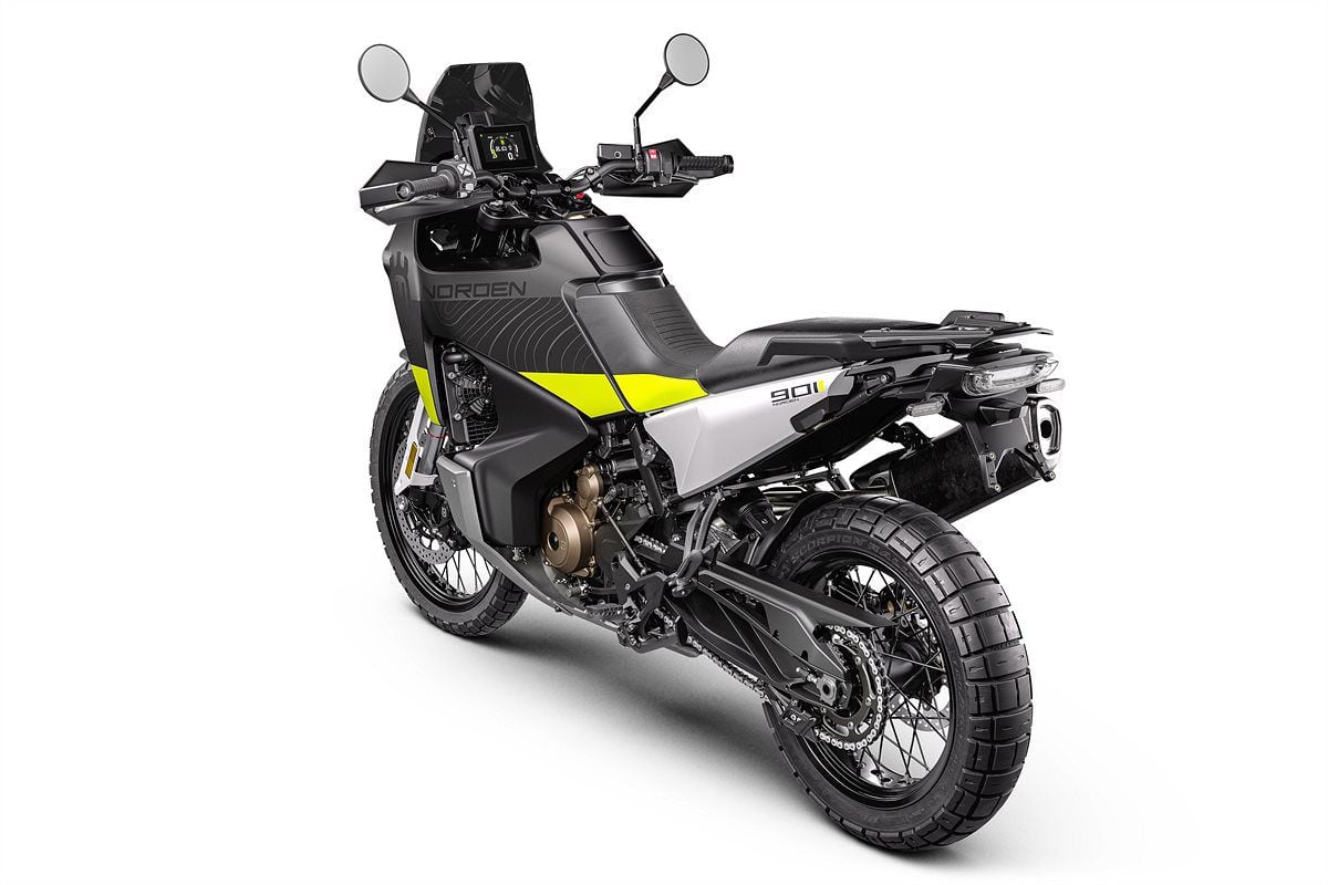 From the rear you can better see the production Norden’s full-length integrated fairing, direct-link rear shock, and big-block Scorpion Rally STR tires. Two-piece seat (height) and handlebar (fore and aft) are also adjustable.