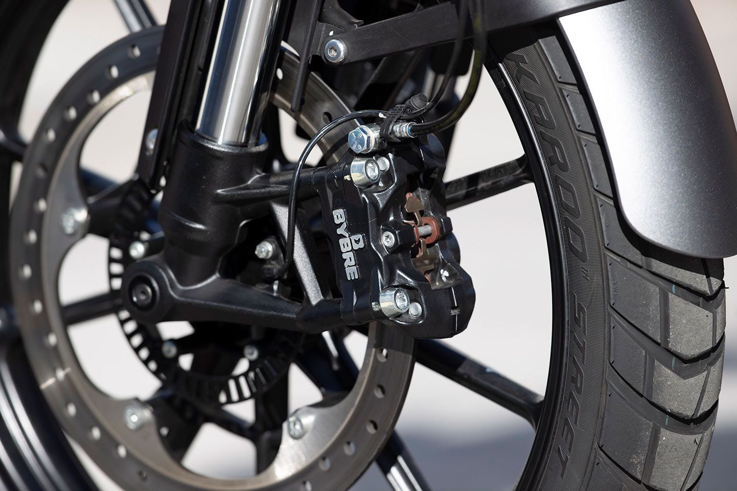 Both the Speed and Scrambler 400 X use a four-piston radial-mount caliper, but the Speed has a more aggressive pad compound.