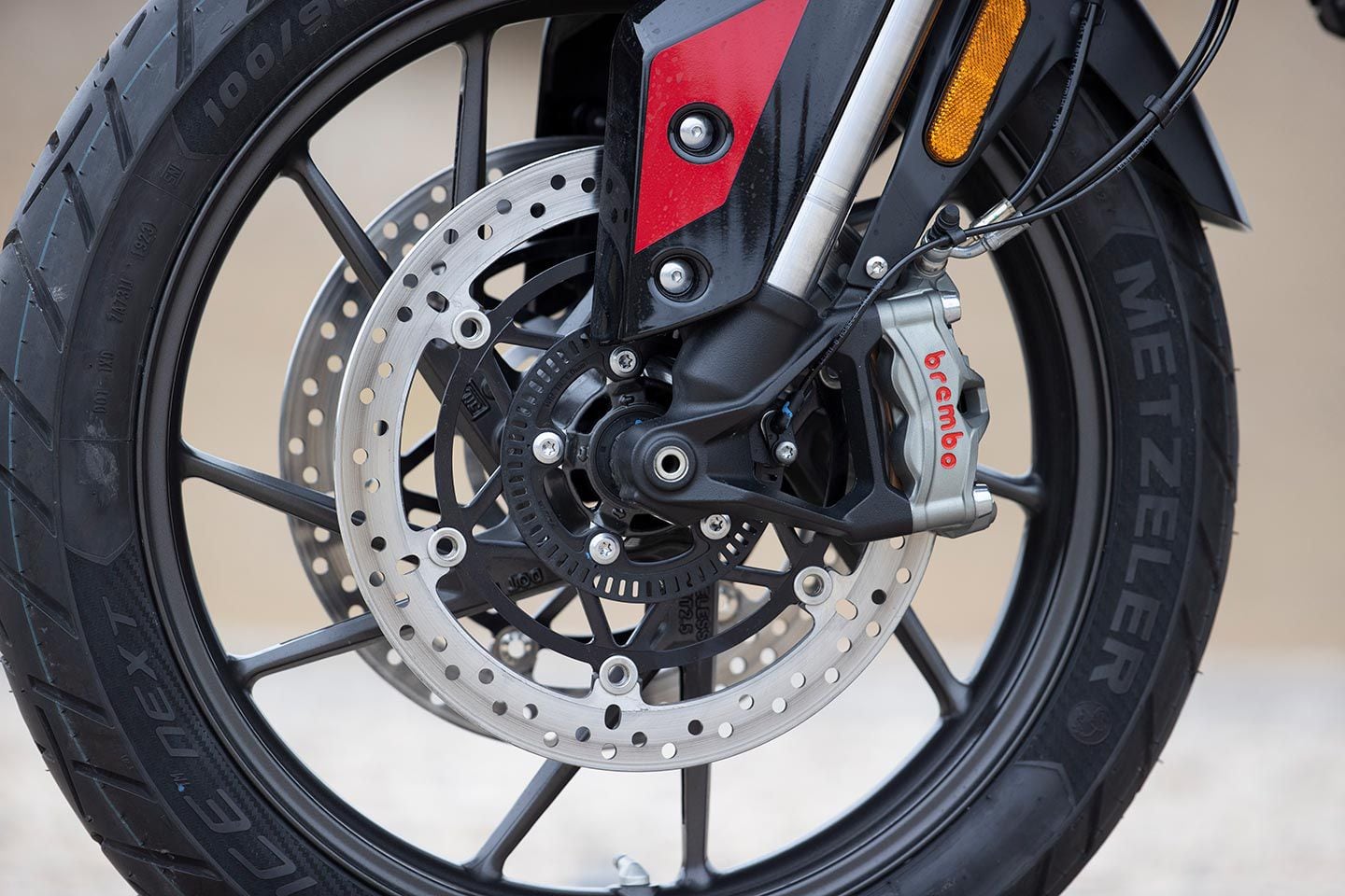 Brembo four-piston Stylema calipers clamp 320mm dual front discs on the GT Pro and Rally Pro.